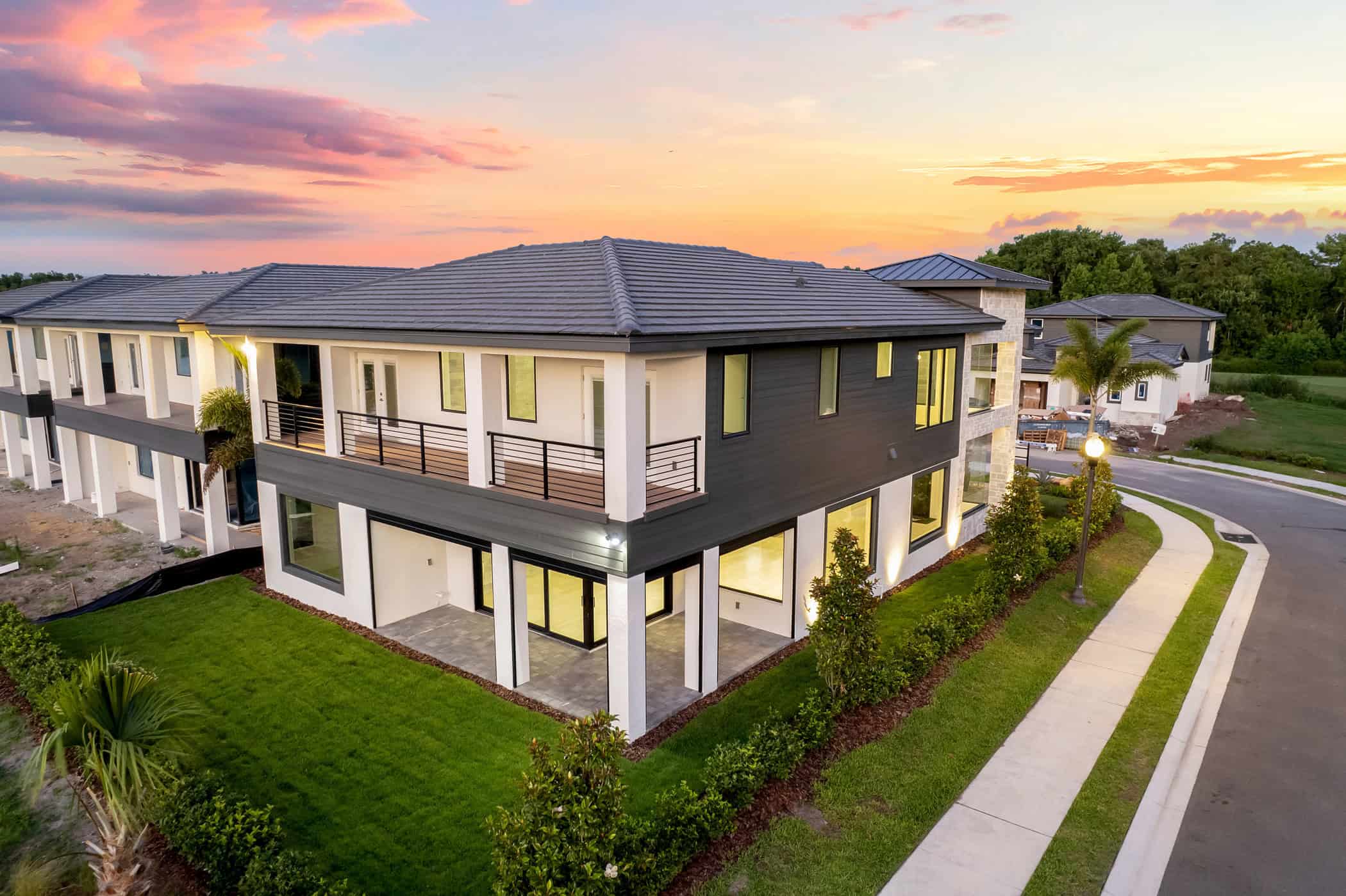 Back view dusk - contemporary luxury home by ABD Development