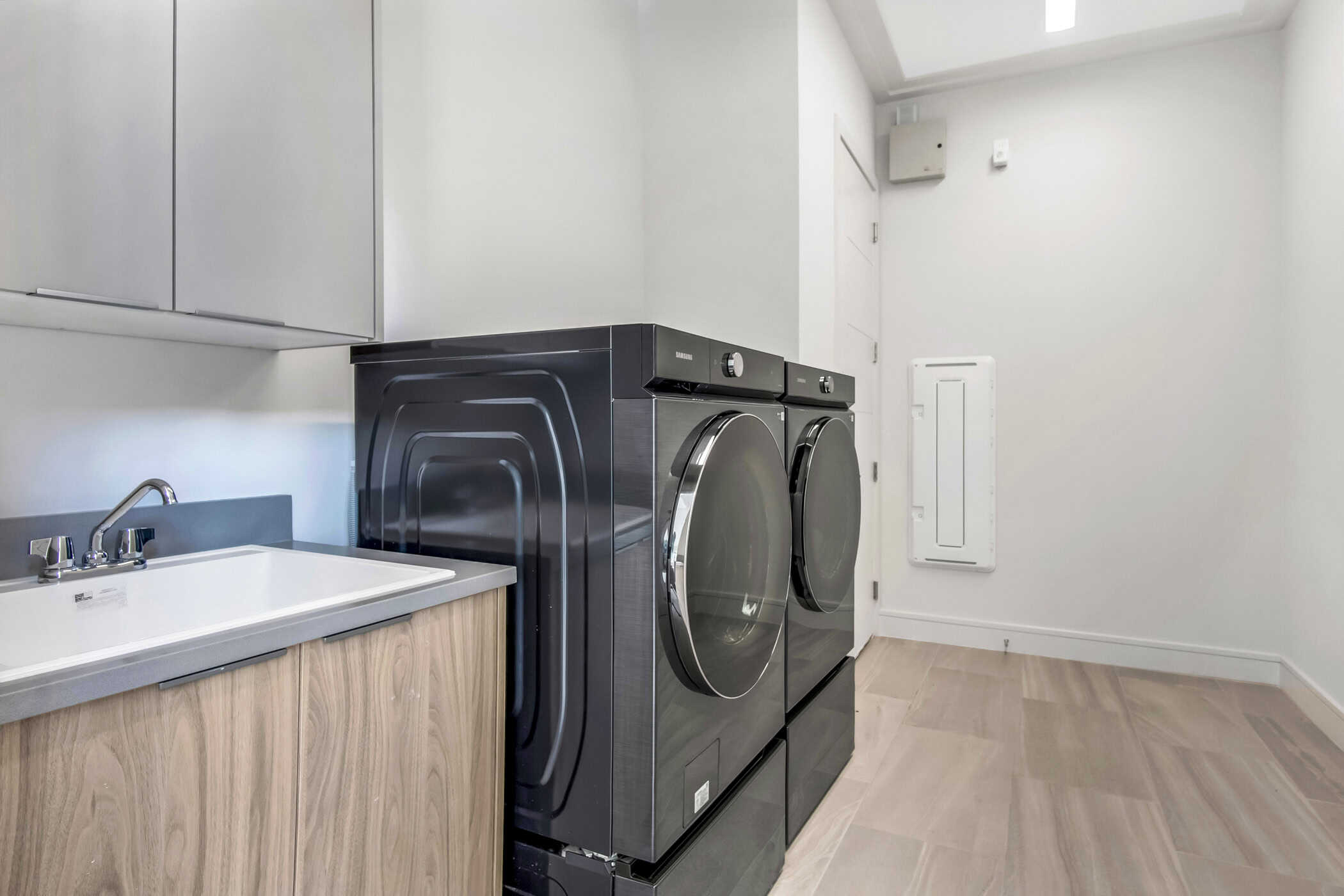 Laundry room - contemporary luxury home by ABD Development